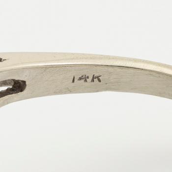 A 14K gold ring set with diamonds.