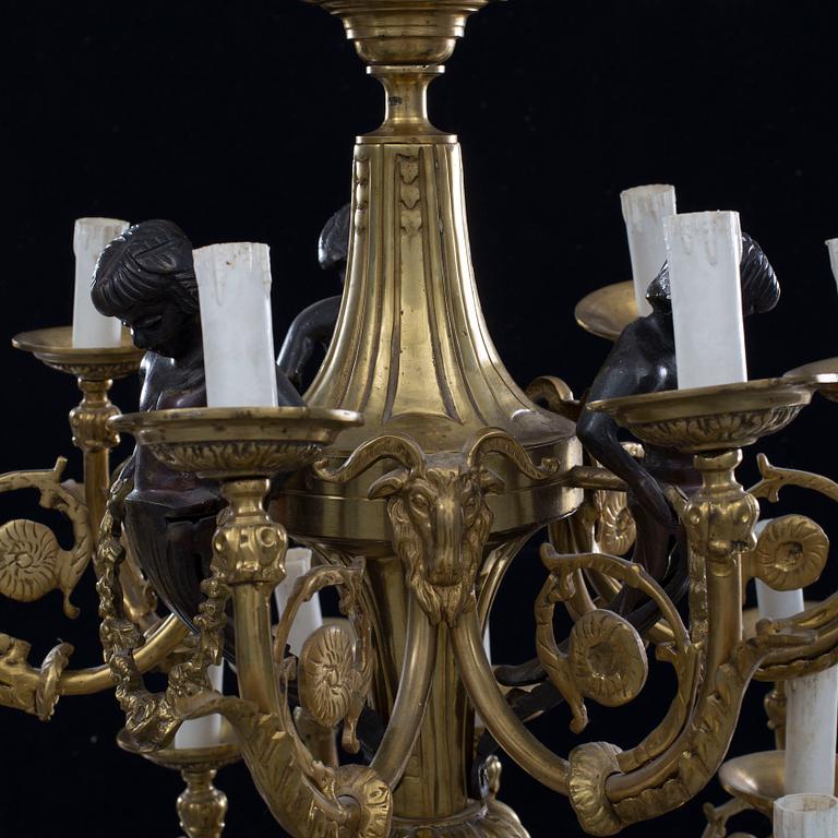 A Louis XVI-style brass chandelier, first half of the 20th Century.