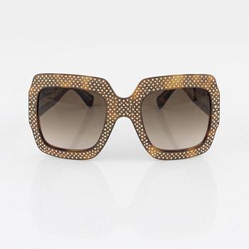 Gucci, a pair of sunglasses, 2016.