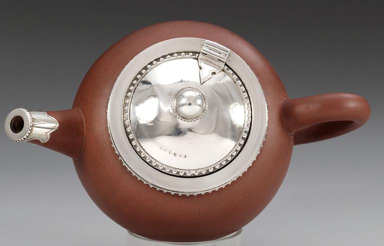 A silver mounted Yixing tea pot with cover, Qing dynasty, 18th Century.