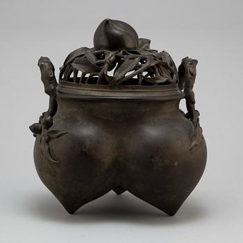 A Japanese bronze incense burner with cover, 20th century.