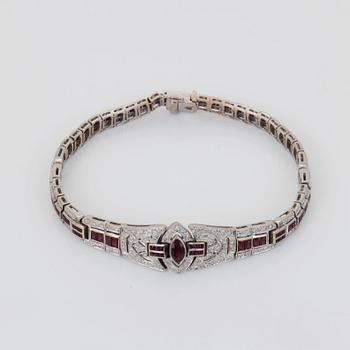 A brilliant-cut diamond and ruby bracelet.