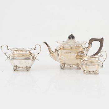 An English Silver Coffee Pot, Creamer and Sugar Bowl, mark of Josiah Williams & Co, London 1903-04.