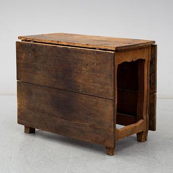 An 18th century gateleg table.