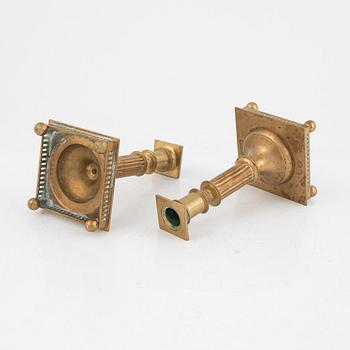 A Pair of Brass Candlesticks, Gusum.
