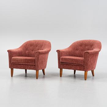 A pair of 1960s easy chairs.