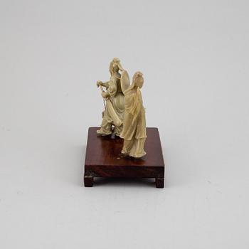 Two Soapstone figure groups, China, 20th Century.