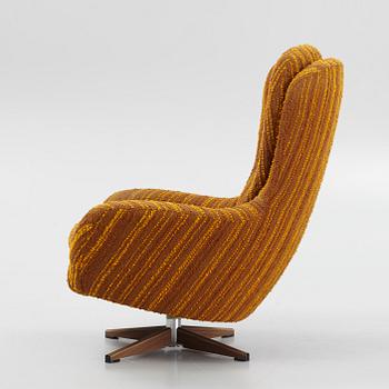 A 'Salome' swivel easy chair from Swedfurn from äround 1970.