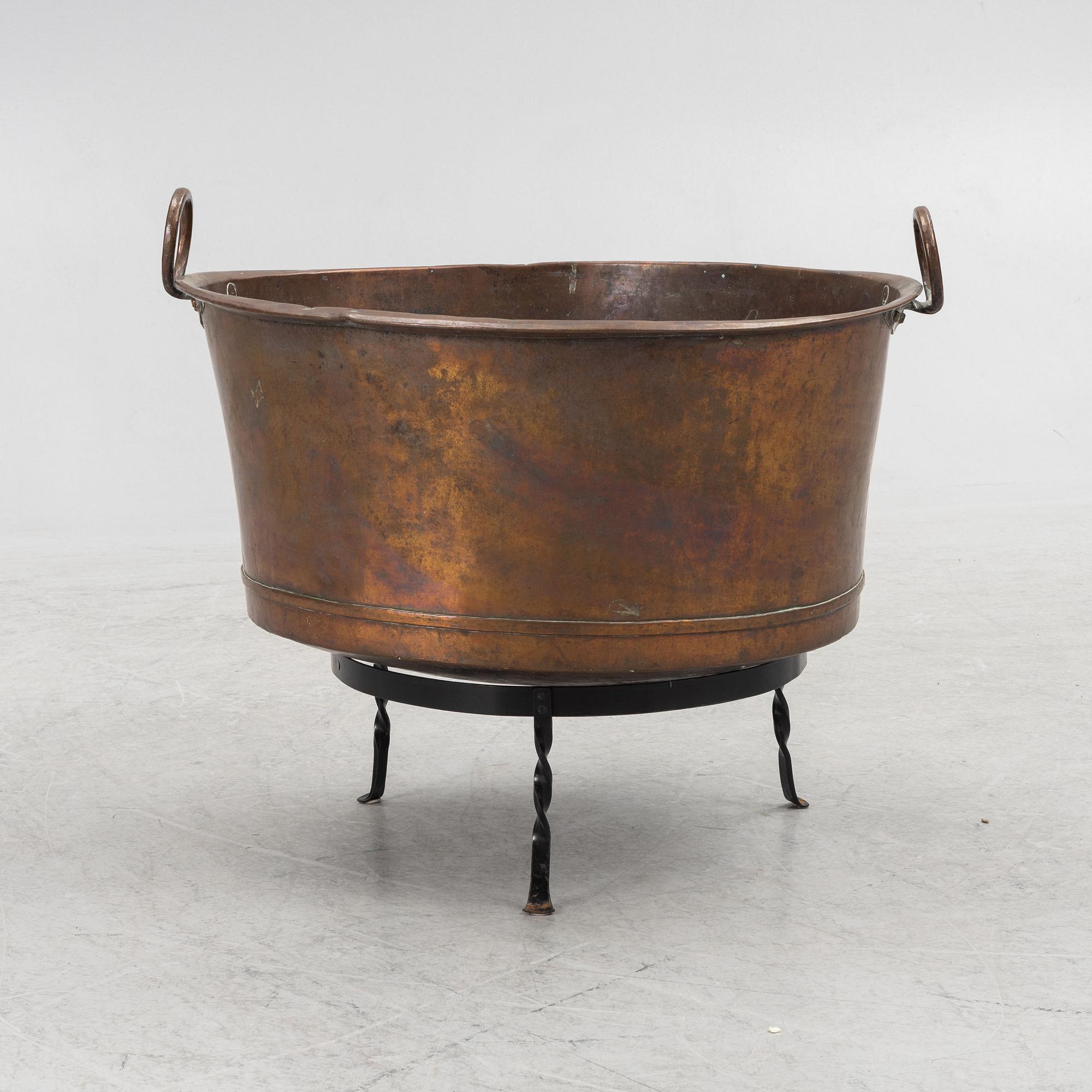 A 19th century copper tub.