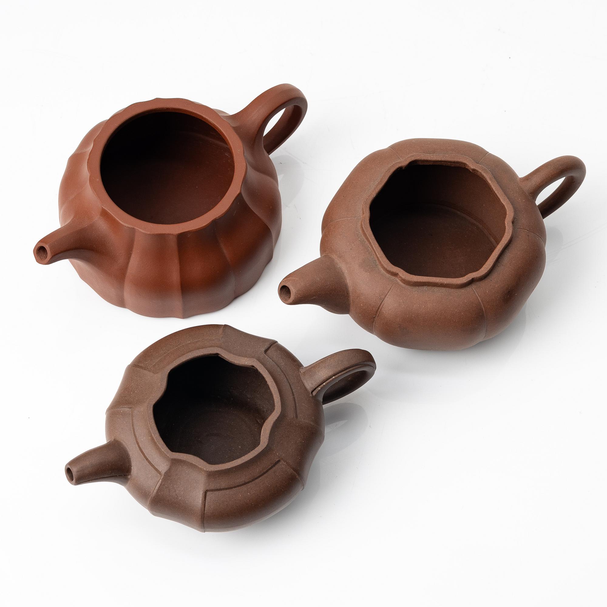 A group of three yixing teapots, China, 1980s.