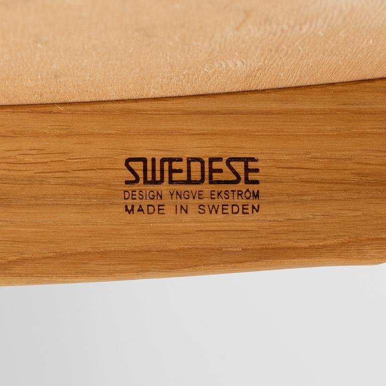Yngve Ekström, a "Lamino" armchair with ottoman, Swedese, Sweden, 2014.
