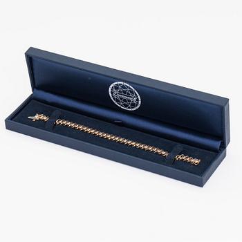 A 14K gold bracelet with light brown diamonds ca. 2.38 ct in total.