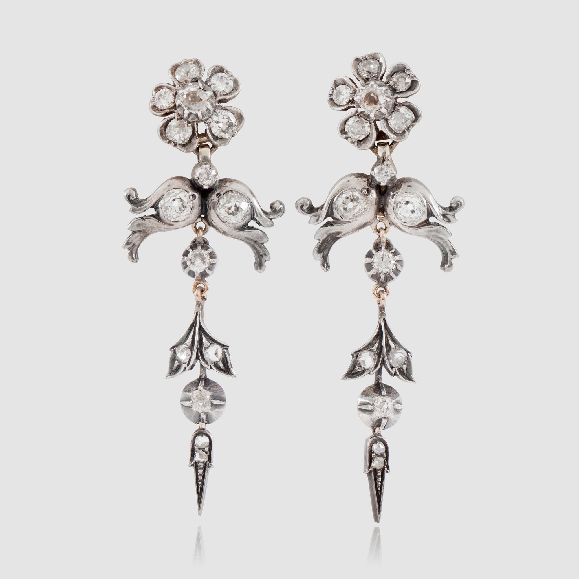 A pair of old- and rose-cut diamond earrings. Total carat weight circa 2.75 cts.