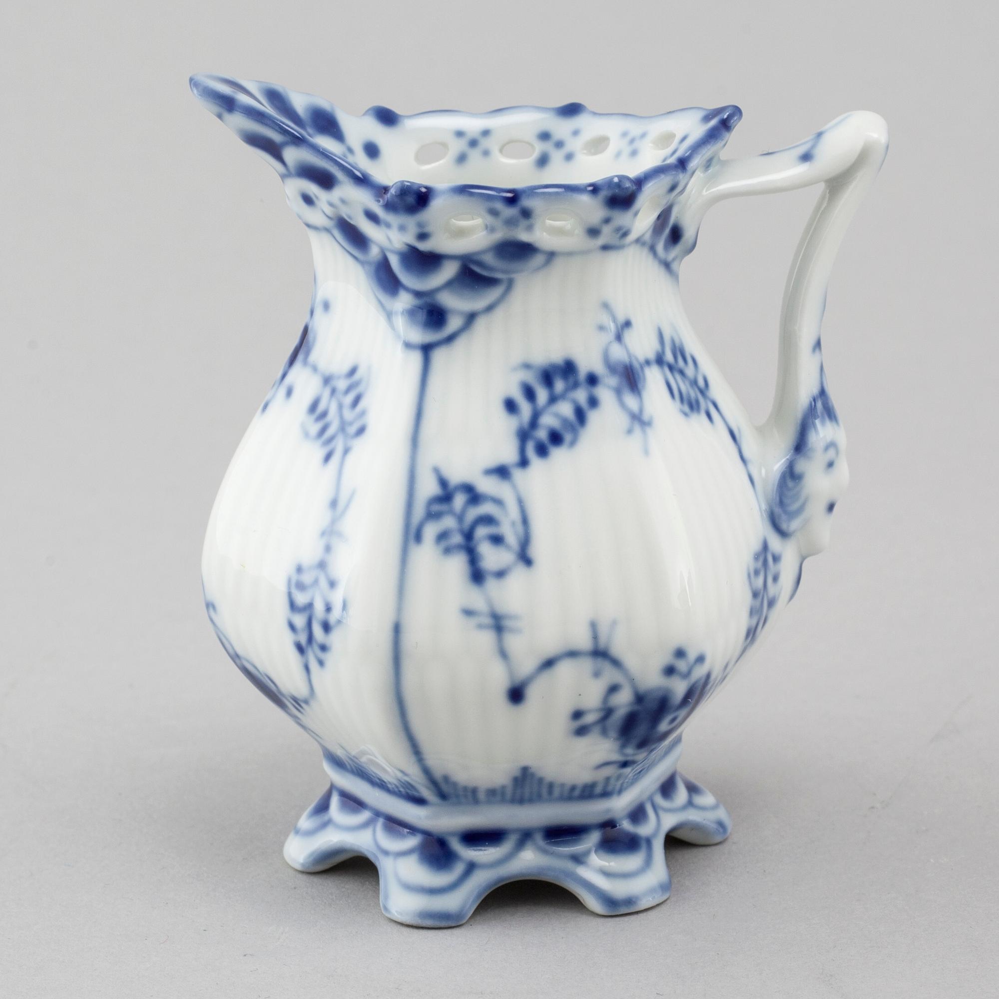 A 9 piece 'Musselmalet' part-mocca service, by Royal Copenhagen, second half of the 20th century.