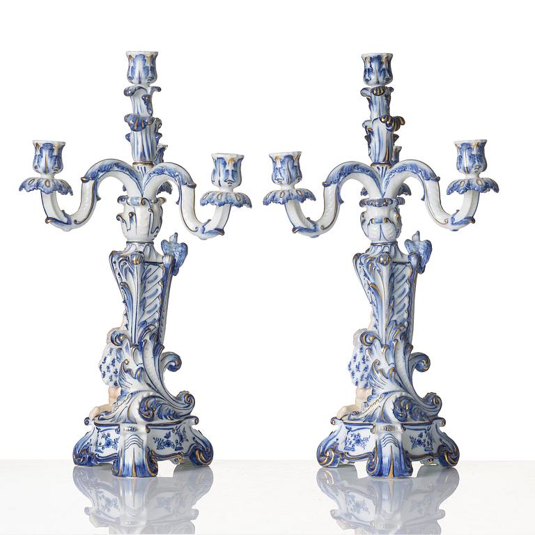 A pair of Royal Copenhagen 'Blå blomst' four-light candelabras, Denmark, 1900-tal.