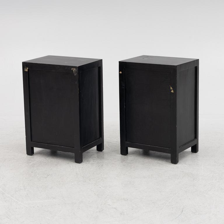 A pair of bedside tables/cabinets, China, 20th century.