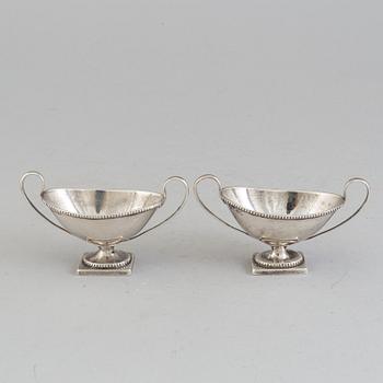 a pair of silver salt cellars, London, 1877.