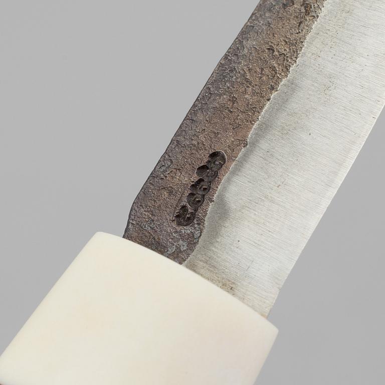 A traditional sami knife by Torgny Odén in Bruksvallarna. Signed and dated 2003.