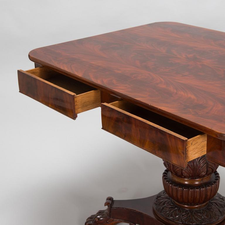 An Empire mahogany table from around 1830s-40s.