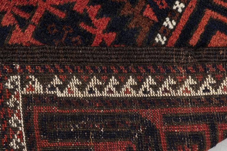 A rug, antique Baluch, ca 193 x 103 cm.