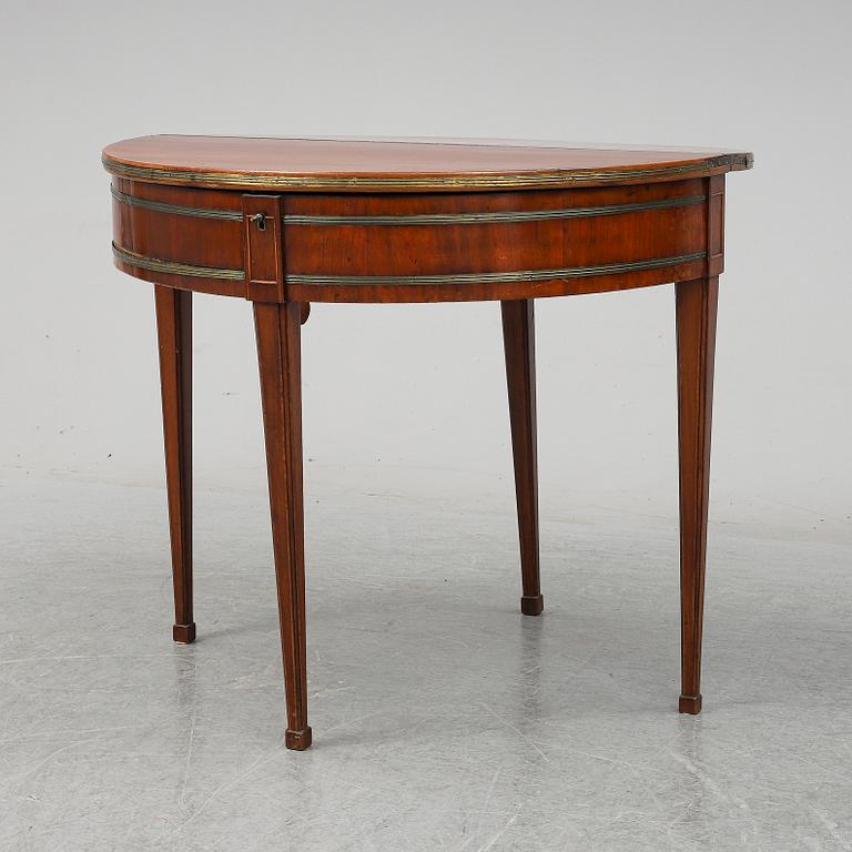 A Directoire games table.