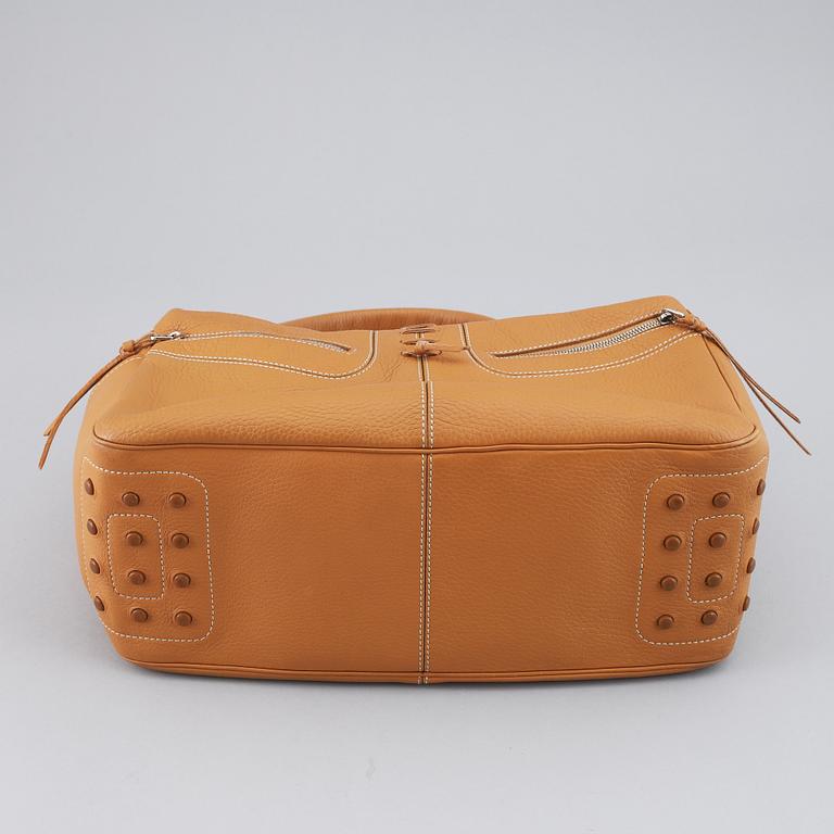 TOD'S, a tan leather bag.