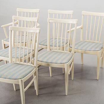 A dining group of 7 pieces by Carl Malmsten for Bodafors from the second half of the 20th century.