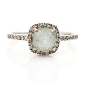 Ring, 18K white gold with blue topaz and brilliant-cut diamonds.