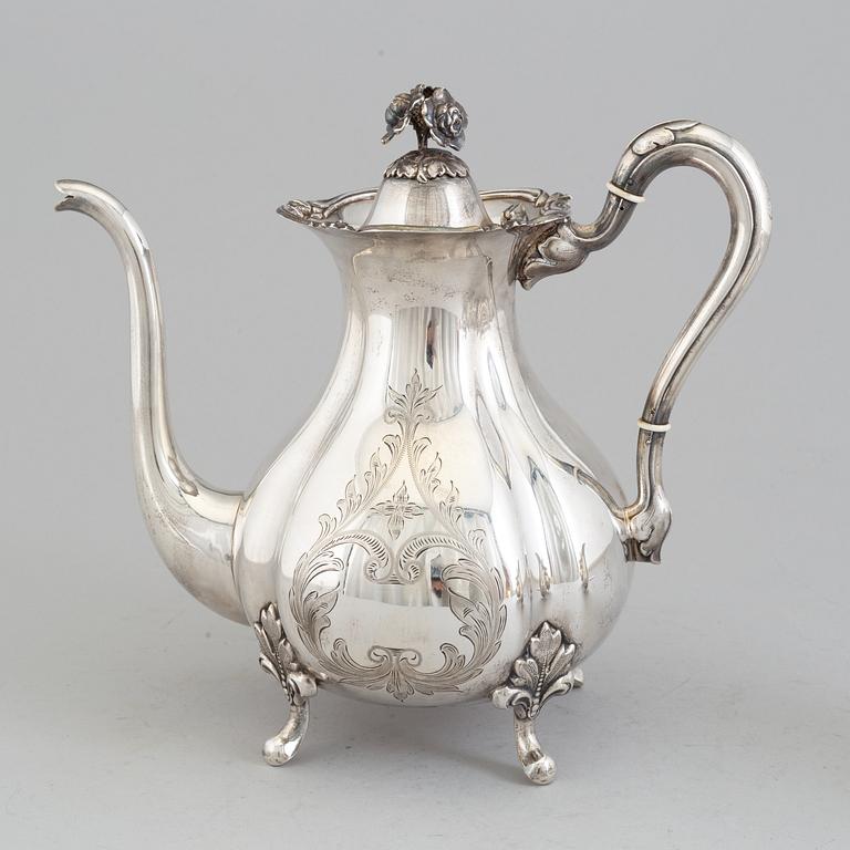 A 3 part silver coffee service dated 1937.