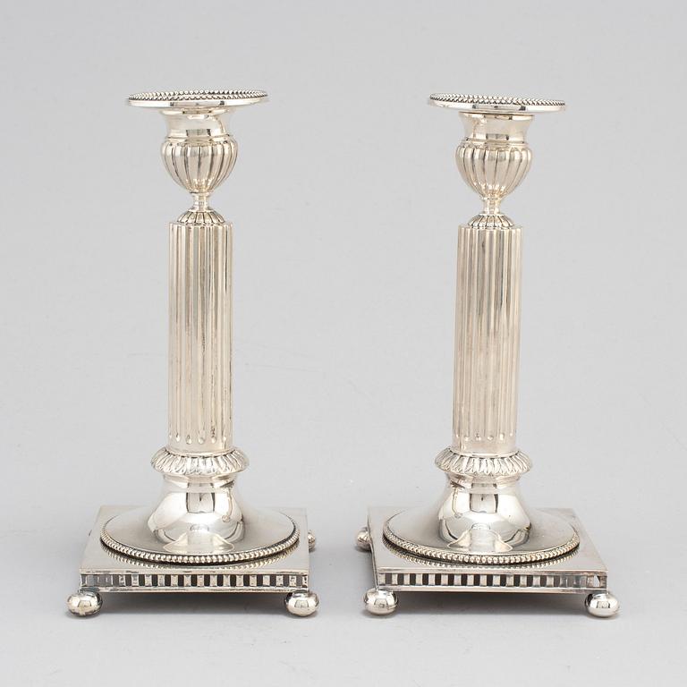 LJUSSTAKAR, ett par, silver, GAB, Stockholm, 1919.