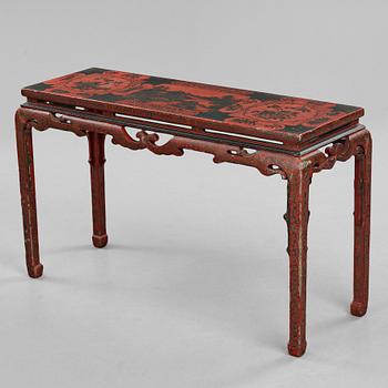 A Chinese lacquered table, Qing dynasty (1664-1912).