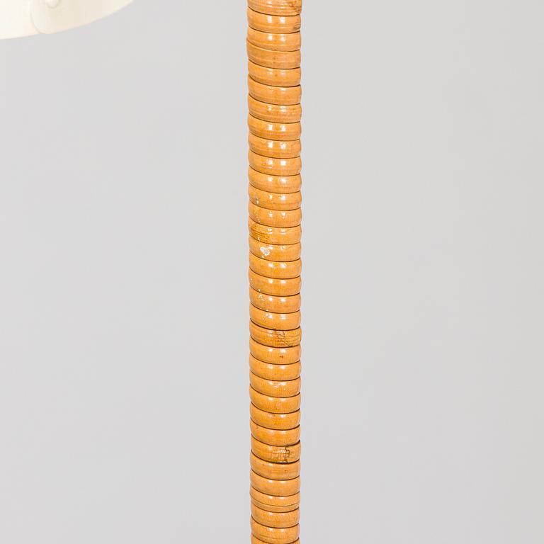 Paavo Tynell, a pair of mid-20th century K10-10 floor lamps for Taito Finland.