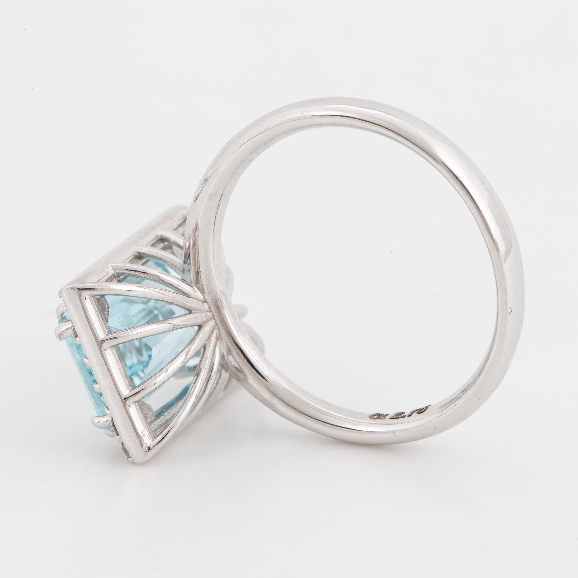 Aquamarine and brilliant-cut diamond ring.