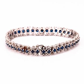 A white gold bracelet with sapphires and 8/8 cut diamonds ca. 0.75 ct in total.