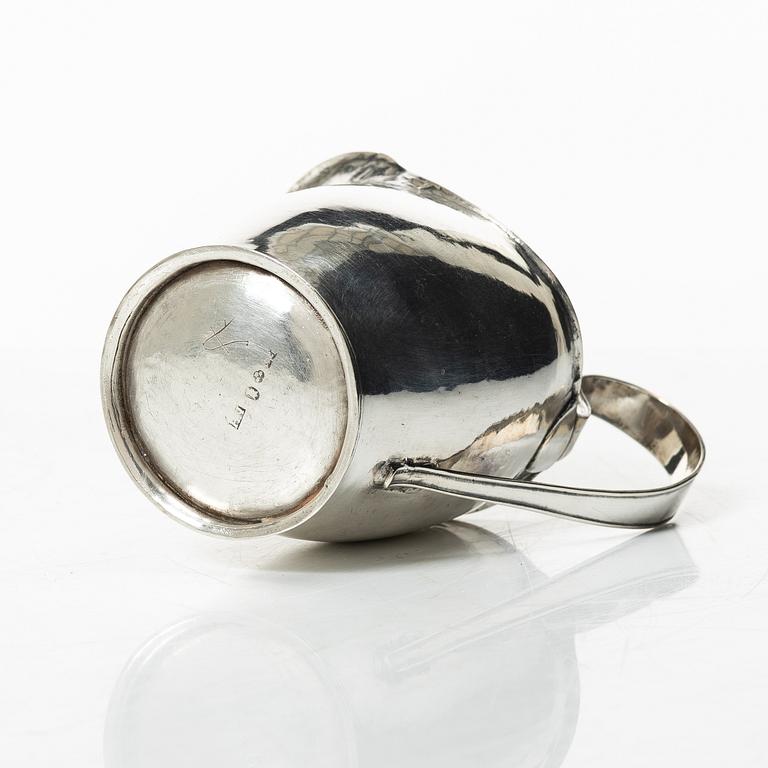 A Swedish 19th century silver creamer, mark of Nils Högrell, Stockholm 1823.