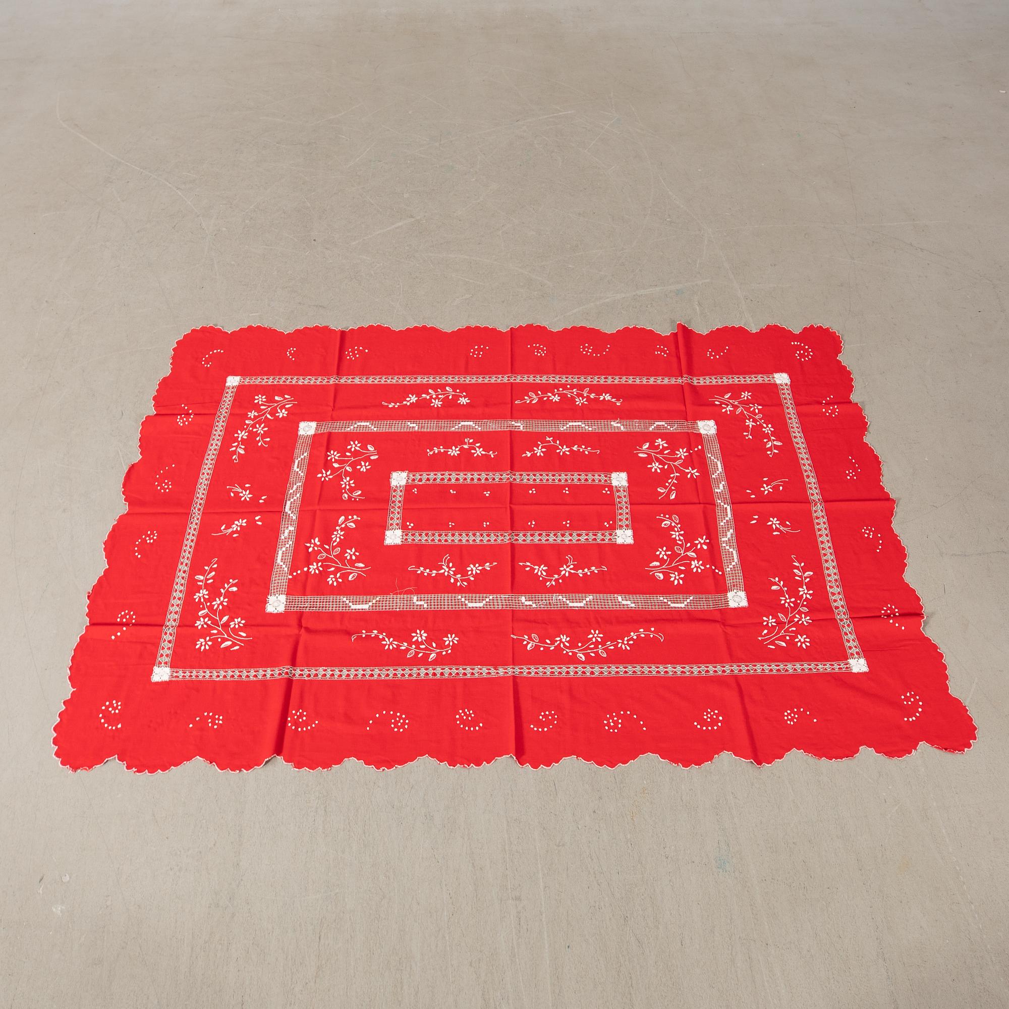 A collection of Christmas tablecloths 12 pcs first half/mid 20th century.