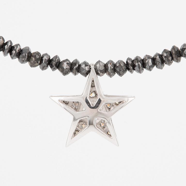 Necklace, Atelier Ajour, black diamonds with a star pendant set with brilliant-cut diamonds.