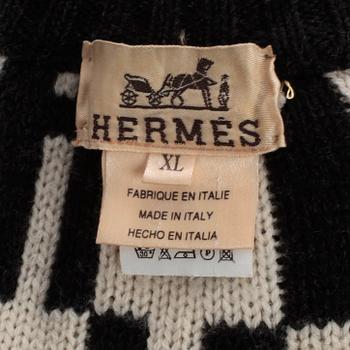 HERMÈS, a men black and white monogrammed wool sweater.