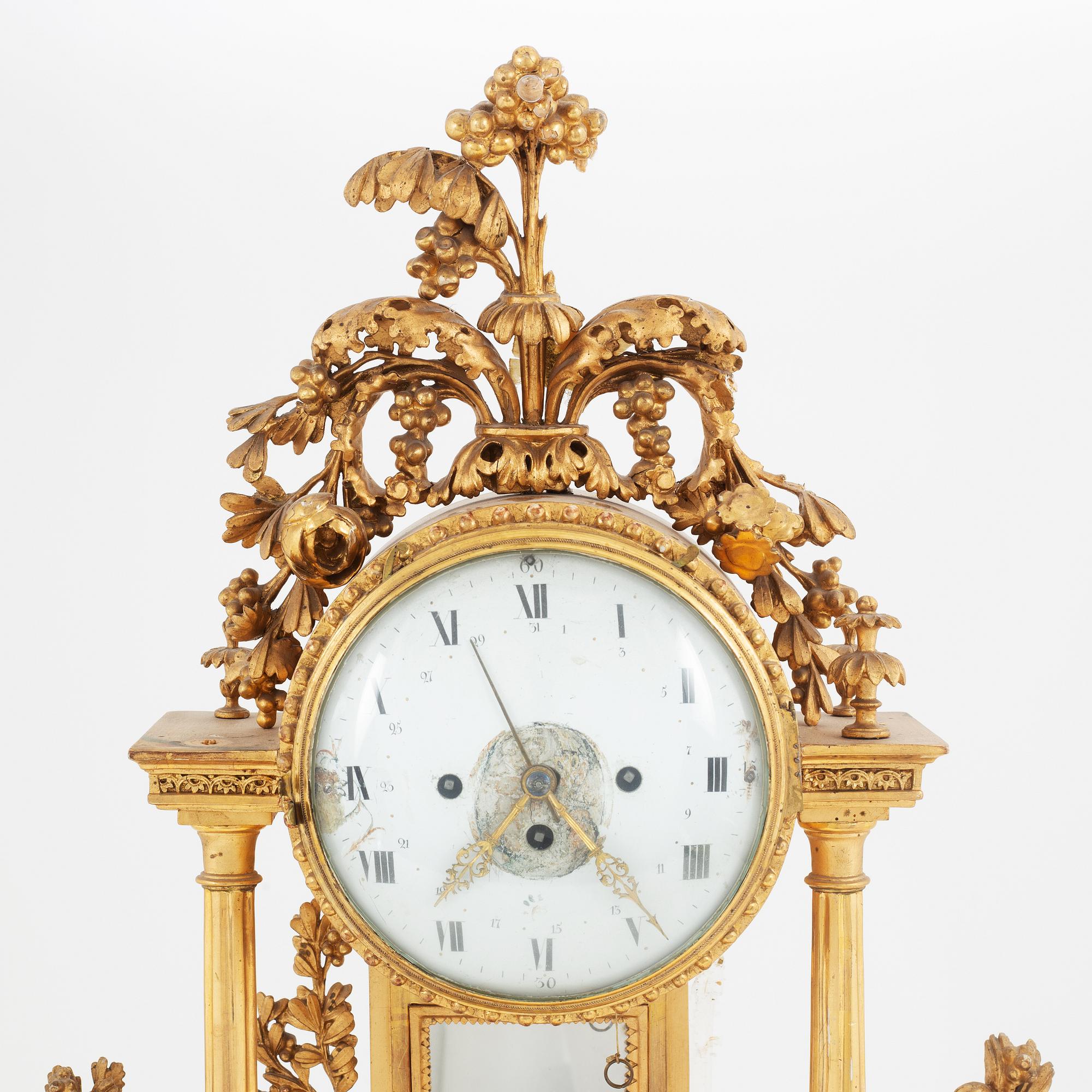 A Late Gustavian giltwood mantel clock, circa 1800.