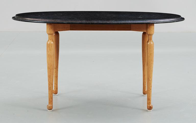 A Josef Frank black marble, mahogany and walnut table, Svenskt Tenn.