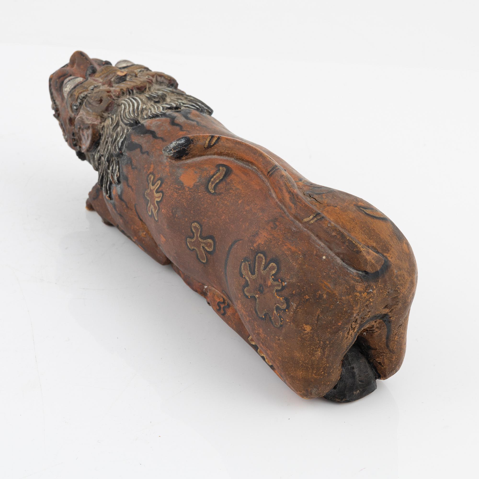 A wooden sculpture, South East Asia, 20th Century.