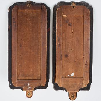 A matched pair of one-light girandole mirrors by Nils Meunier 1775.