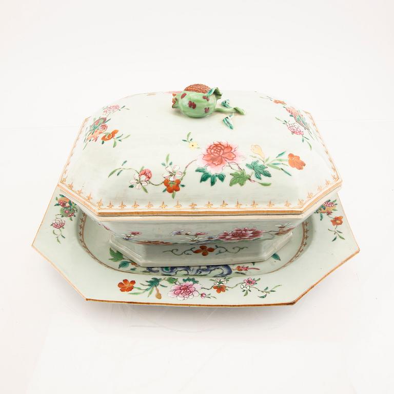 A Chinese famille rose tureen with cover and plate later part of the 18th century.
