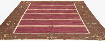A carpet, flat weave, c. 360 x 270 cm, possibly by Handarbetets vänner, Stockholm, Sweden.