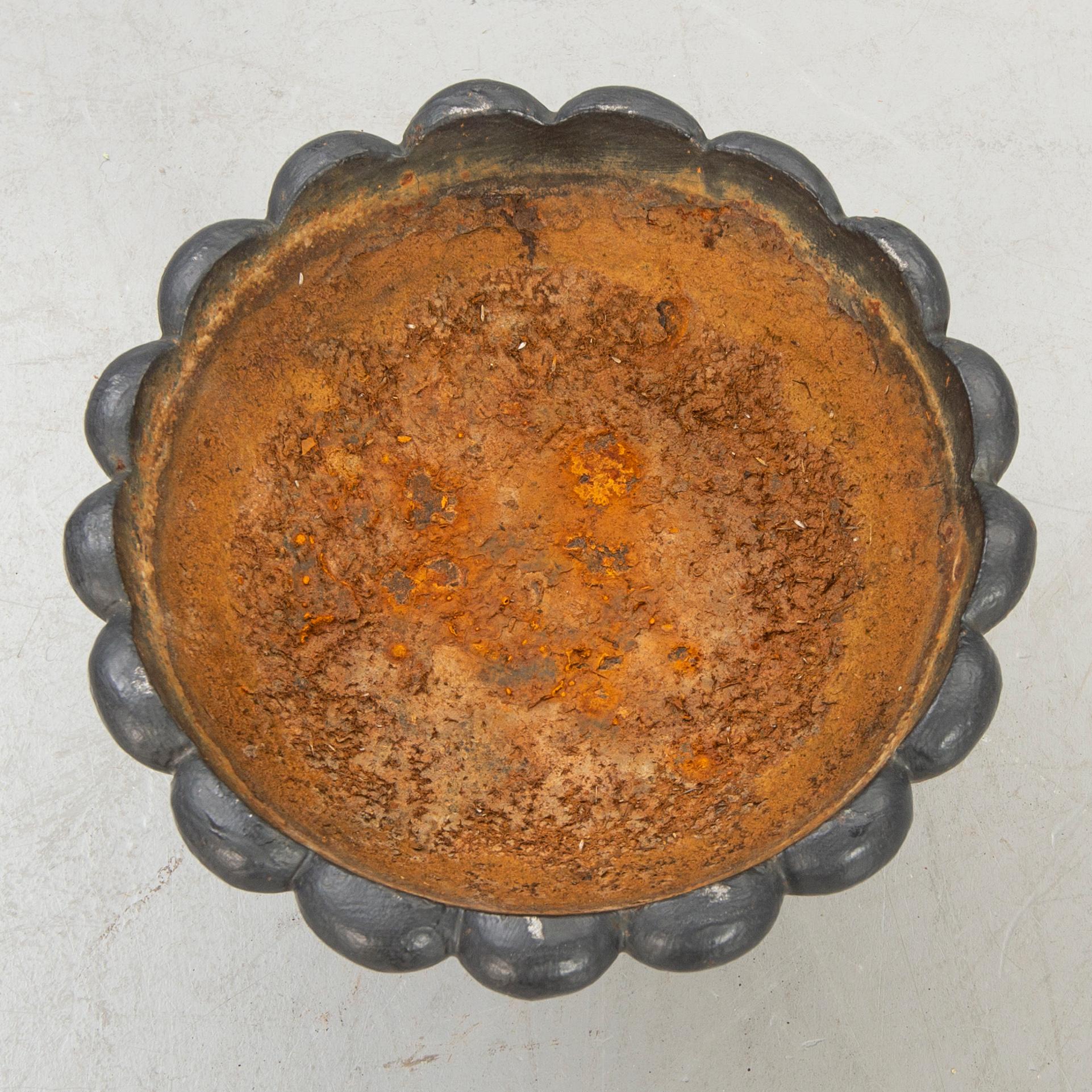 A cast iron bird bath 20th century.