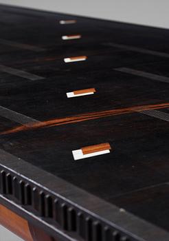 A Hjalmar Jackson ebony and pear wood desk / library table, Stockholm 1934, possibly designed by Oscar Nilsson.