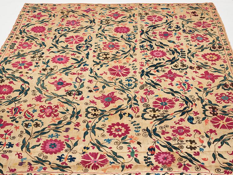 An embroidery, an antique suzani, Ura Tube or the Ferghana valley, ca 250,5-253,5 x 185,5-191,5 cm.