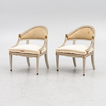 A pair of Gustavian style armchairs, early 20th century.