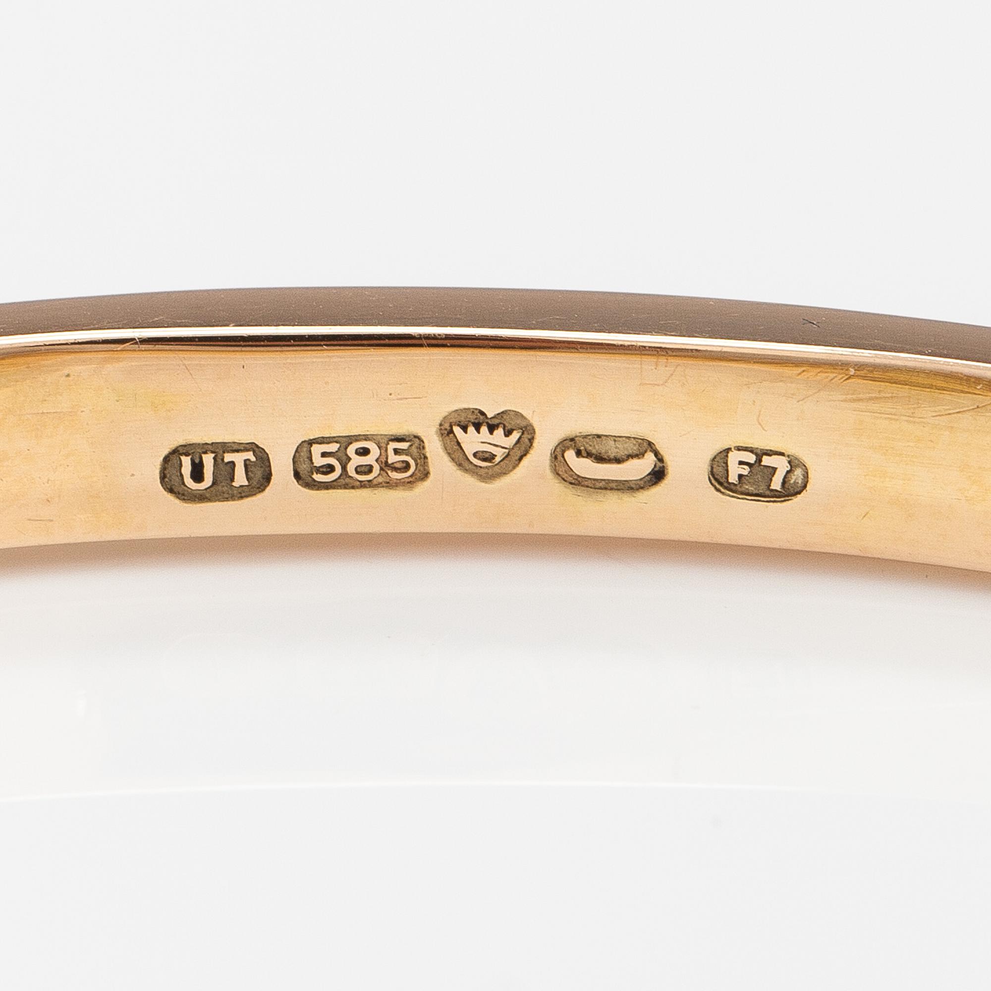 Armband, 14K guld, syntetiska rubiner. Tarkkanen Oy, Helsingfors 1959.