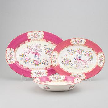 A part 'Pink Cockatrice' dinner and coffee and tea service, England, Minton, early 20th century (123 pieces).